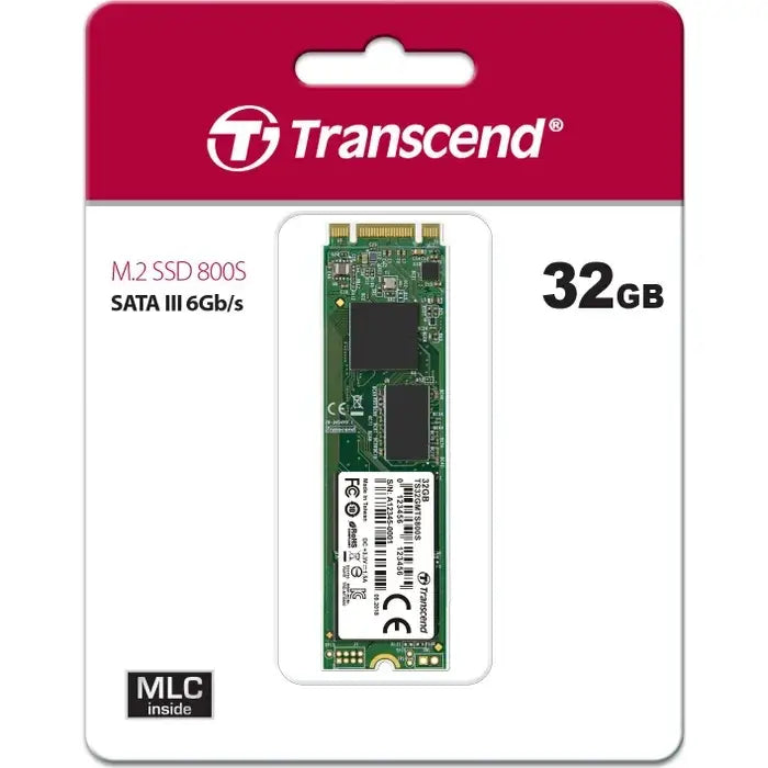 Transcend m.2 ssd 64gb sata s pevnou deskou zelene barvy a cernymi cipmi v bilem baleni s cervenym nazvem 32gb